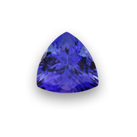 Lively fine Tanzanite trillion.  This 7 mm Tanzanite is deep royal blue with purple, fuschia undertones and faceted beautifully.  A very pretty gem perfect as a center stone for a Tanzanite ring or would also be lovely for a Tanzanite pendant.