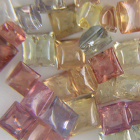 Multi color untreated sapphire in buff top squares. These Umba square sapphires are natural untreated sapphires and come in  various sizes and many earthy colors such as pastel piWe are delighted to offer a rare and exceptional selection of untreated sapp