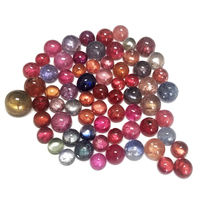 Multi color untreated sapphire cabochons in assorted shapes and sizes.  These are natural untreated sapphires and come in many colors and shades such as orange sapphire cabs, yellow sapphire cabs, green green sapphire cabochons, blue sapphire cabocho