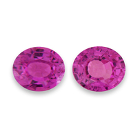 Pair of oval pink sapphires. This lovely pair of bubble gum pink oval sapphires are well cut shape, clean and very lively.  This intense pink sapphire pair would be perfect as pink sapphire earrings or side stones.