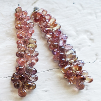 Beautiful natural untreated dusty rose pink sapphire briolettes drops. These fully faceted and clean sapphire briolette grapes that have a graduate in size from small to larger at bottom are perfectly cut with drilled holes ready to use as is or can be se