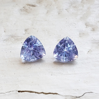Lovely pair of trillion blue Lavender sapphires.  This periwinkle purple sapphire trillion pair would be perfect for earrings or as accent stones.
