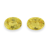 Matching pair of oval light lemon yellow sapphires. This pair of yellow sapphire ovals are bright. Nice oval light to medium yellow sapphire pair as side stones for a ring or lemon chiffon yellow sapphire stud earrings! 