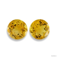 Pair of round golden yellow Citrines.  These would be great in a pair of earrings.
