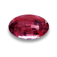 Lively pomegranate untreated red spinel. This oval reddish pink spinel is vibrant with flashes of of pink, plum and pomegranate.  Great size at over 2 carat spinel.
