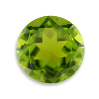 Large 12 mm round yellow green tourmaline with lots of life.  This brilliant natural green tourmaline with yellow undertones is well cut and very clean