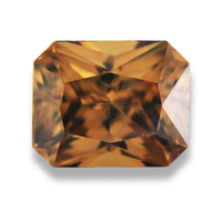 Super brilliant emerald-cut cognac zircon.  This clean and very well cut diamond like natural untreated zircon has flashes of champagne and amber.  Very striking natural gemstone!