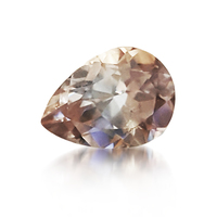 Scintillating pear shape light mocha zircon.  This well cut diamond like natural and  untreated zircon has flashes of rose champagne and cognac and it\'s quite striking at a large size at over 9 carat.  Perfect and rare alternative to the m