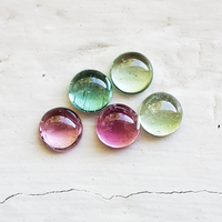 This rare tourmaline parcel of 5.5mm round cabochons have an assortment of colors including baby pink, bubble gum pink mint green and sea foam green. These clean and untreated Maine tourmalines are sold as a 5 stone lot 3.46 ct tw.