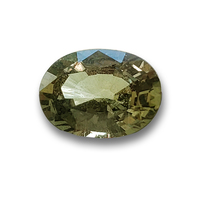 This over 3 carat oval shape natural untreated green sapphire is from the Umba River region of Tanzania in Africa.  This lively unheated pistachio or olive green sapphire has a soft organic color palette.