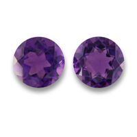 Lovely matched pair of round purple amethyst. This nice 10 mm round pair of amethyst have a rich velvety purple color with great clarity and cut.