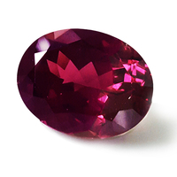 Large oval rhodolite garnet.  This striking oval garnet is deep raspberry red in color and has intense flashes of red, plum, purple and pink.  This untreated oval rhodolite is well cut and is full of life.  