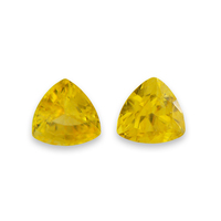 Matching pair of trillion rich lemon yellow sapphires. This pair of yellow sapphire trillions are clean and lively. Nice triangle yellow sapphire pair as side stones for a ring or beautiful yellow sapphire earrings! 
