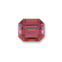 Emerald-cut natural orange sapphire from Africa.  This orange sapphire is unheated.  It is a lively, bright stone with pink red undertones.