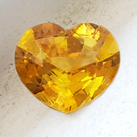 Bright heart shape yellow sapphire.  This intense yellow sapphire heart  is very clean and lively. Golden lemon yellow color sapphire in a perfect well cut heart shape.