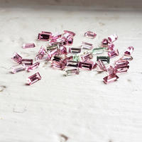 This Maine tourmaline baguette parcel of are beautifully cut in size 4 x 2. This untreated multi-color lot of mint green and assorted pastel pink tourmalines are lively. These untreated Maine tourmaline tiny baguettes are clean, rare and sold as a 19 ston