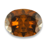 Super lively oval golden zircon.  This clean and nicely cut golden brown zircon is nice larger size with flashes of amber and orange tones.